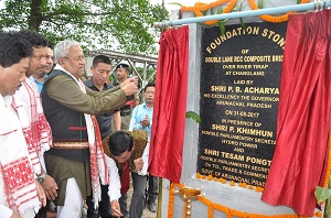 The Governor of Arunachal Pradesh Shri P.B. Acharya laying the foundation stone for a double lane RCC bridge over River Tirap at Changlang on 31st August 2017